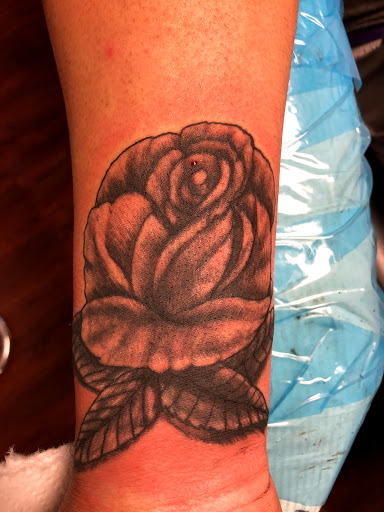 Explore side arm tattoo ideas, creative tattoo ideas in Seymour, available at American Gypsy Tattoo Corp.