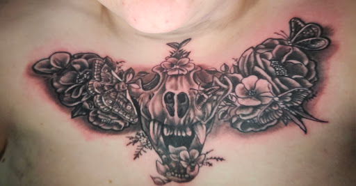 Explore puzzle piece tattoo ideas, creative tattoo ideas in Angola, available at Hoodlum Ink