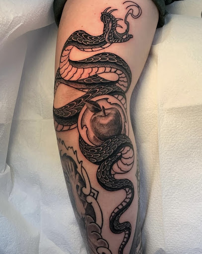 Explore stomach tattoo ideas, creative tattoo ideas in New Orleans, available at TOUGH LOVE TATTOOS