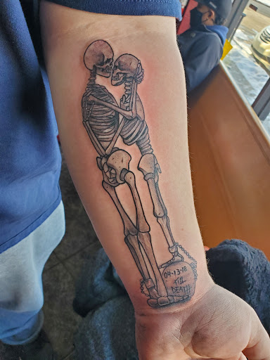 Explore jawline tattoo ideas, creative tattoo ideas in Taylor, available at Babydolls Tattoos