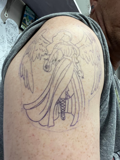 Explore cat memorial tattoo ideas, creative tattoo ideas in Virginia Beach, available at Whiskey River Tattoo