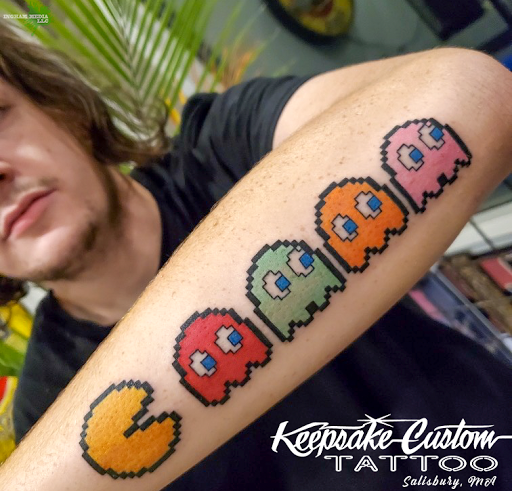 Explore dragonfly flower tattoo ideas, creative tattoo ideas in Salisbury, available at Keepsake Custom Tattoo & Body Piercing Laser Tattoo Removal