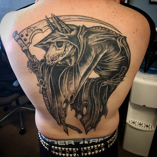 Explore cover up tattoo ideas on arm, creative tattoo ideas in Algoma, available at Shipwreck Tattoo