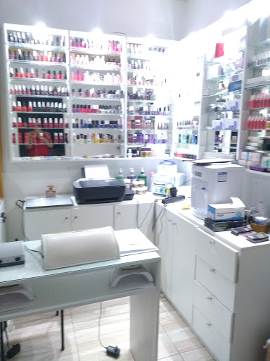 Logo da empresa - Dora Nail's Esmalteria