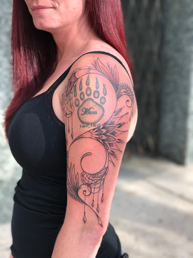 Explore tulip tattoo ideas, creative tattoo ideas in Ogden, available at Savage Tattoo Shop