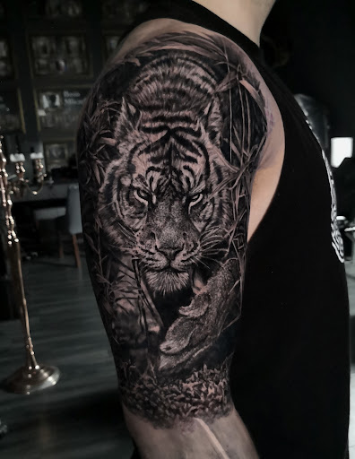Find back tattoo ideas women for your next unique tattoo in Ozone Park at Rebel Ink Tattoo & Piercing