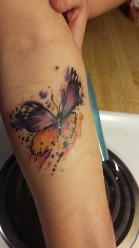 Explore biker tattoo ideas, creative tattoo ideas in Council Bluffs, available at Lil Bros Tattoo