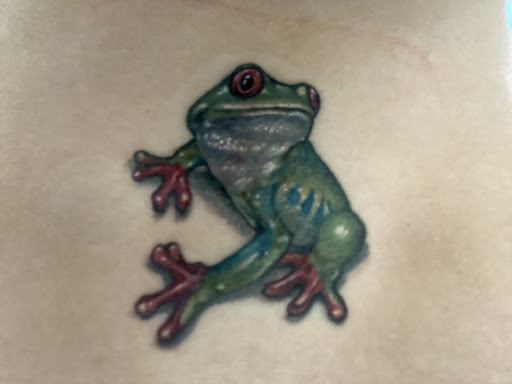 Find tummy tuck scar tattoo ideas for your next unique tattoo in Cranston at Powerline Tattoo