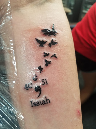 Explore thigh tattoos ideas for guys, creative tattoo ideas in Fort Worth, available at Spinning Needles Tattoos