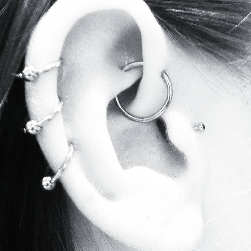 Explore simple cover up tattoo ideas, creative tattoo ideas in Tucson, available at Sacred Art Tattoo Studio