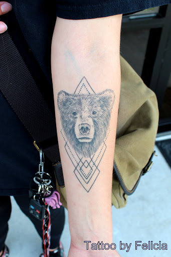 Explore interstellar tattoo ideas, creative tattoo ideas in Fort Myers, available at Tiger Lotus Tattoo and Piercing