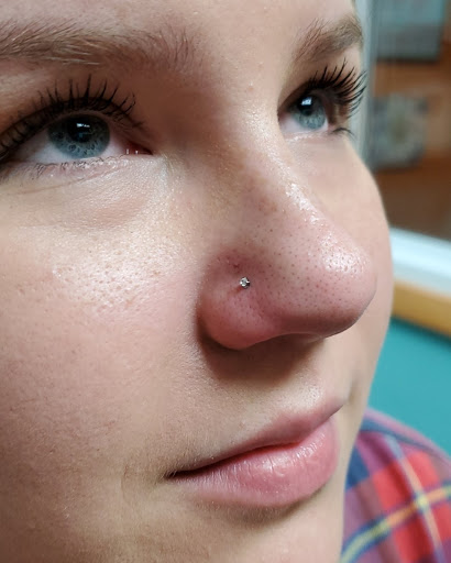 Tattoo Shop «Skin of A Different Color», reviews and photos, 2080 E New York St, Aurora, IL 60502, USA