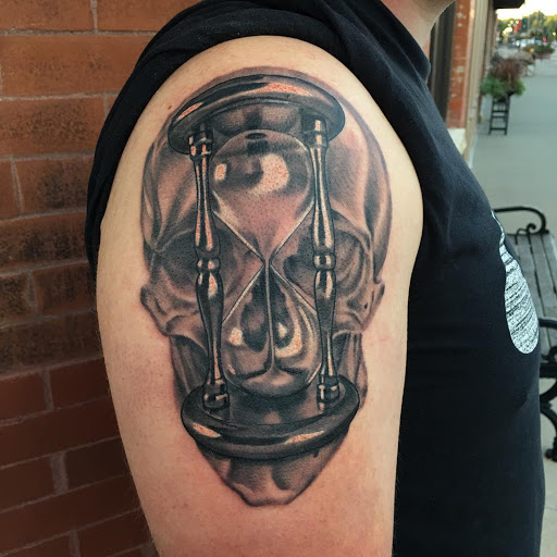 Explore sun tattoo ideas for guys, creative tattoo ideas in Brooklyn, available at Broad St. Tattoo