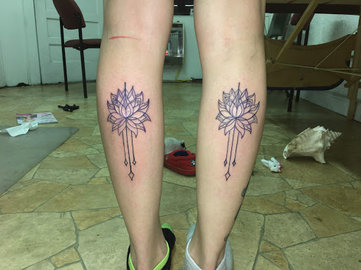 Explore cute face tattoo ideas, creative tattoo ideas in Paris, available at Twizted Dezignz