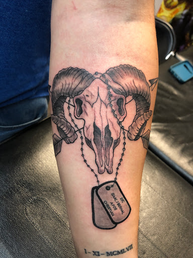Explore back of the ear tattoo ideas, creative tattoo ideas in Alamosa, available at The Shop Tattoo & Comics