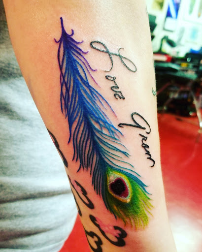 Explore patriotic forearm tattoo ideas, creative tattoo ideas in Council Bluffs, available at Skin Mechanix Inkorpar8ted