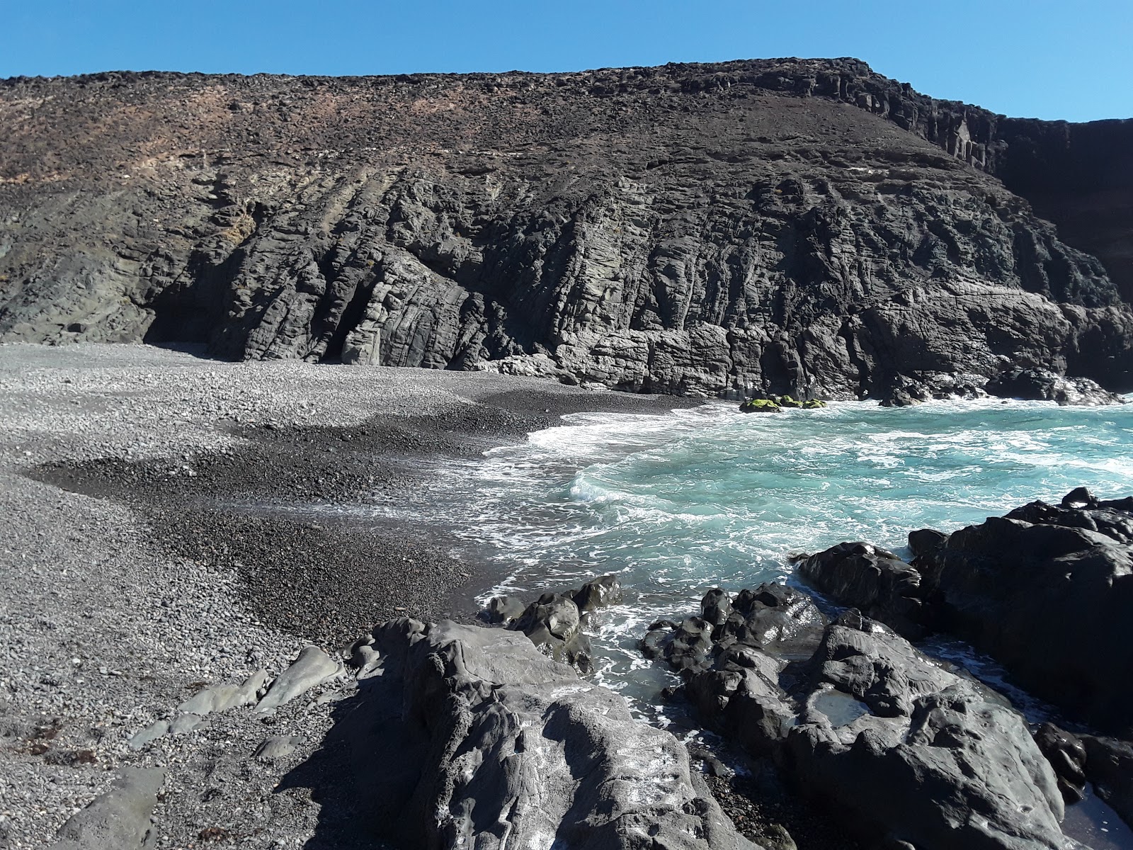 Fotografija Playa de los Mozos z modra čista voda površino