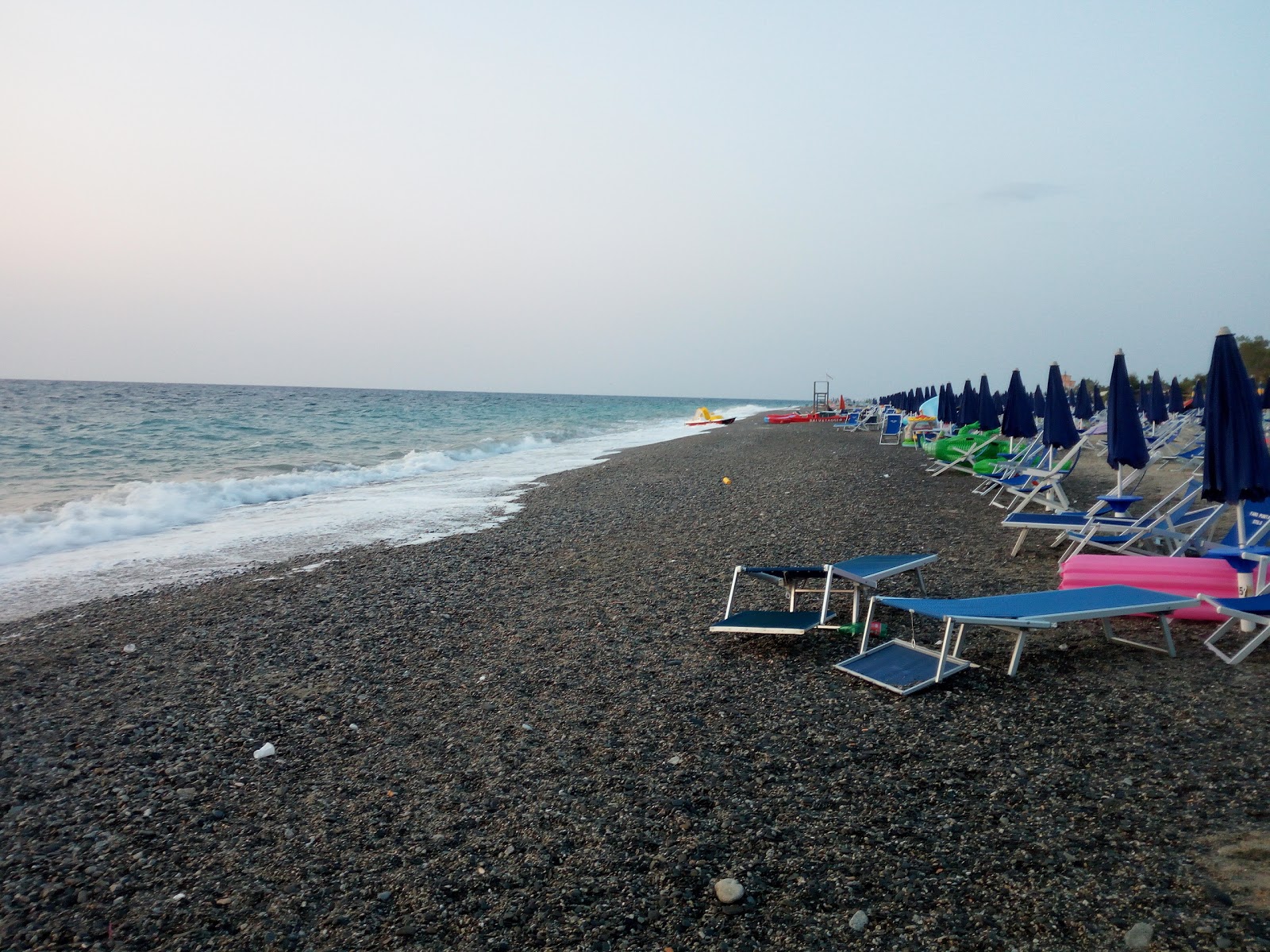 Photo de Campomarzio beach avec l'eau bleu de surface