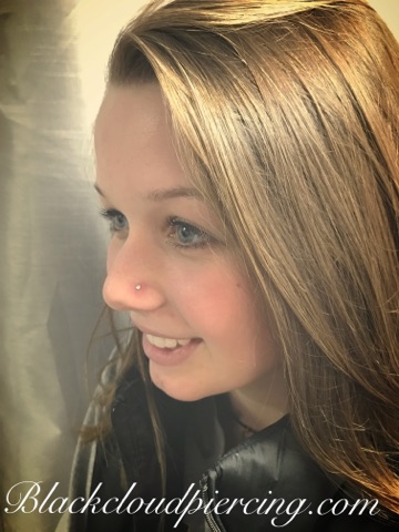 Explore watercolor flower tattoo ideas, creative tattoo ideas in Pineville, available at Black Cloud Tattoo and Piercing