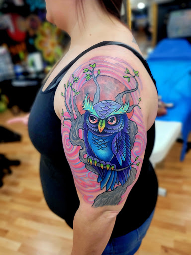 Explore lady ankle tattoo ideas, creative tattoo ideas in Benton, available at Spectrum Tattoo