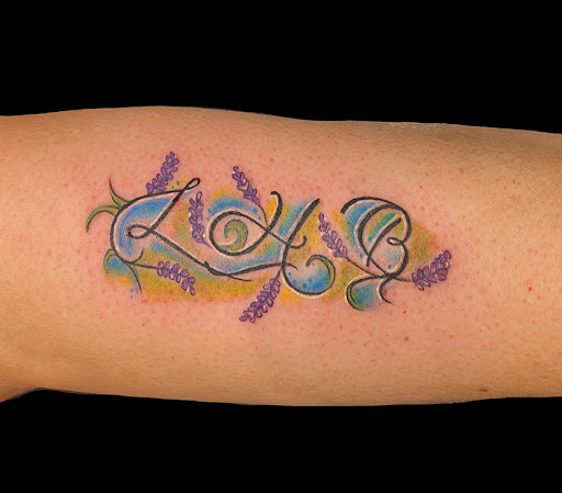 Explore tattoo ideas on thigh, creative tattoo ideas in Mesa, available at Club Tattoo