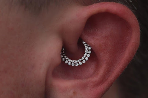 Explore spine tattoo ideas, creative tattoo ideas in Hollywood, available at Sacred Eye Tattoos