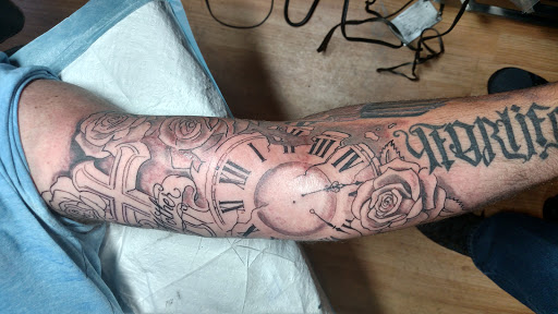 Explore elbow tattoo ideas for guys, creative tattoo ideas in Grand Rapids, available at Brenda Sues Tattoos