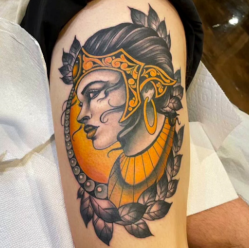 Explore back neck tattoo ideas, creative tattoo ideas in Senoia, available at Messenger Tattoo Studio
