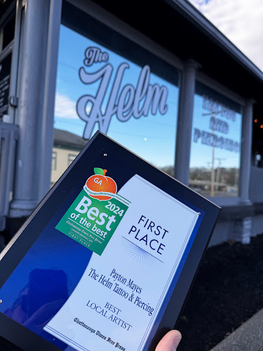 Explore big flower tattoo ideas, creative tattoo ideas in Fort Oglethorpe, available at The Helm Tattoo & Piercing