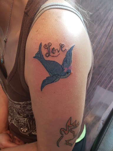 Explore wedding band tattoo ideas for him, creative tattoo ideas in Davis, available at SIX GUN SOUND TATTOO