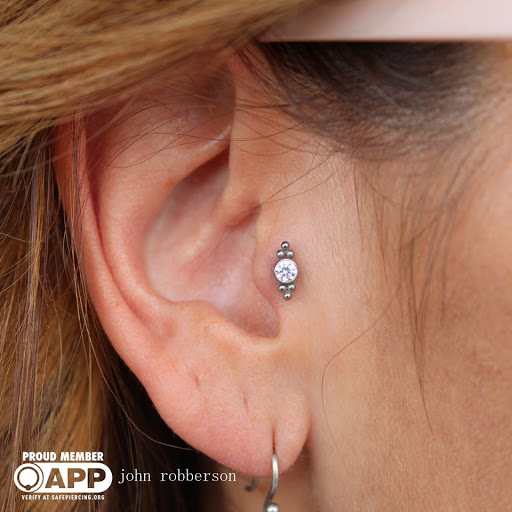 Explore graffiti tattoo ideas, creative tattoo ideas in Fort Myers, available at Tiger Lotus Tattoo and Piercing