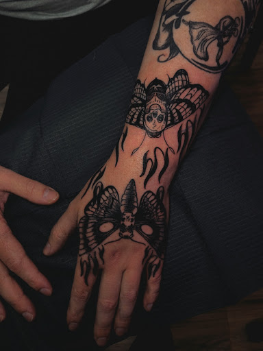 Explore tattoo matching ideas, creative tattoo ideas in North Tonawanda, available at Dark Side Ink Tattoo Studio