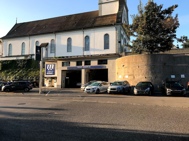 Garage Moderne SA - Peugeot - Reisebüro