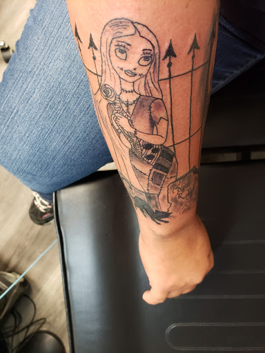 Explore blackout sleeve tattoo ideas, creative tattoo ideas in Greenfield, available at Tattoos In Time Studio