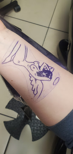 Explore religious tattoo ideas for women, creative tattoo ideas in Normal, available at Smokin Aces Tattoo Company