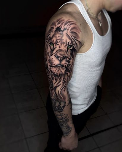 Explore breastfeeding tattoo ideas, creative tattoo ideas in Lavonia, available at 1890 Tattoo Co.
