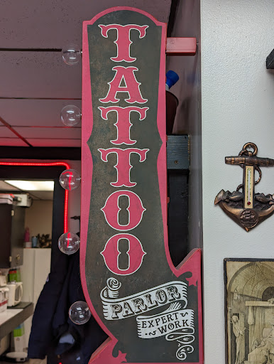 Explore lower belly tattoo ideas, creative tattoo ideas in Brighton, available at Inkwell Tattoos