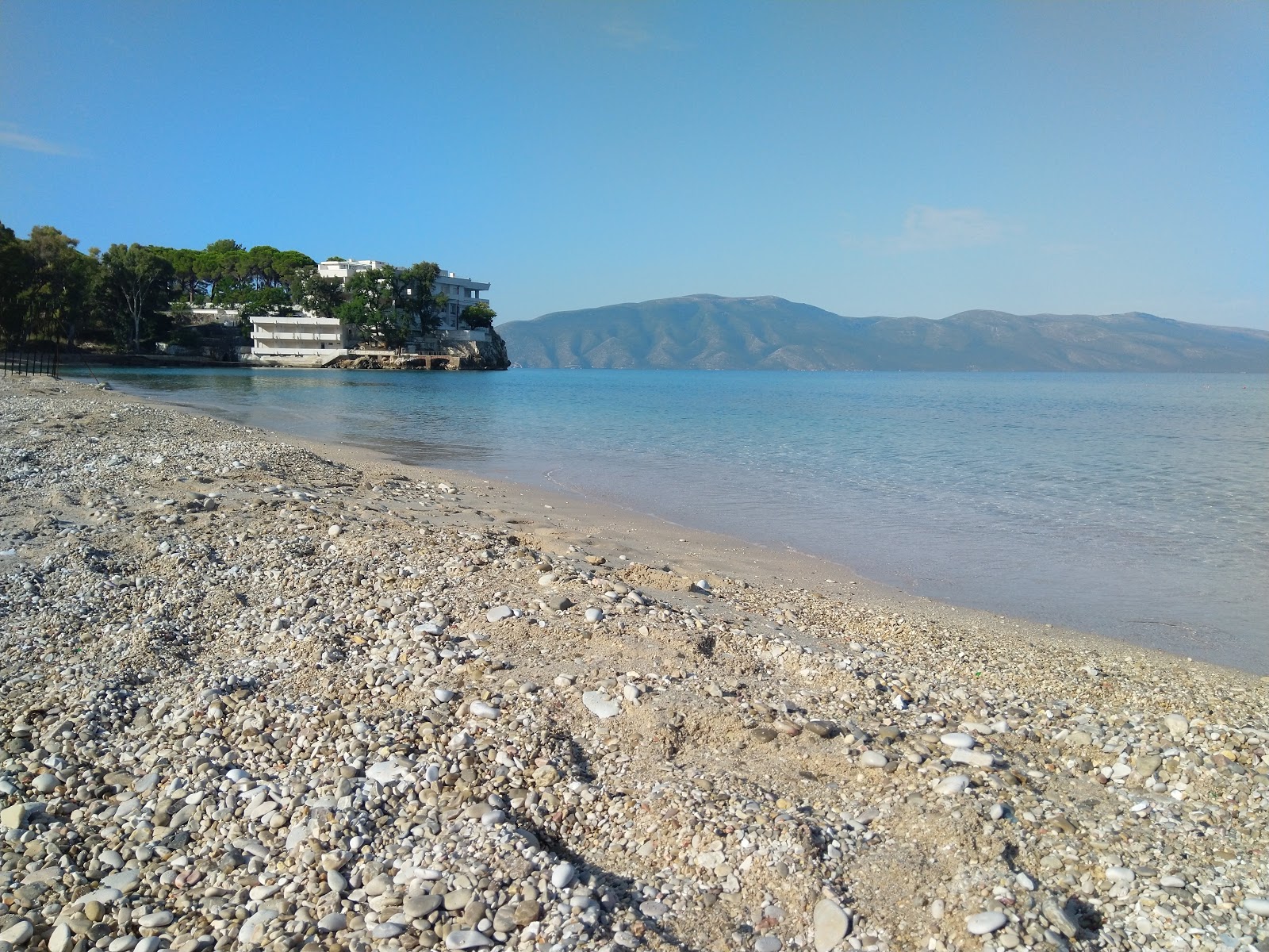 Photo of Vlore beach backed by cliffs