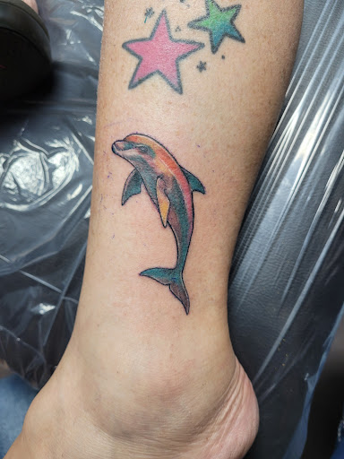 Explore dog memorial tattoo ideas, creative tattoo ideas in Bradenton, available at Memory Lane Tattoo Co.