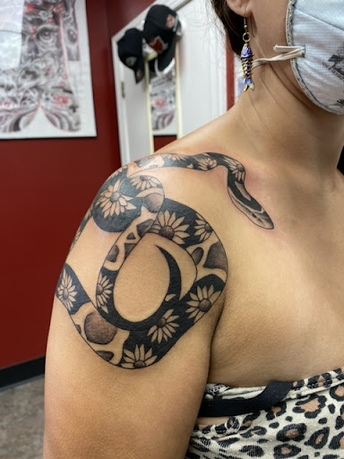 Explore tattoos for your daughter ideas, creative tattoo ideas in Raleigh, available at Warlocks Tattoo Inc (No Piercings)