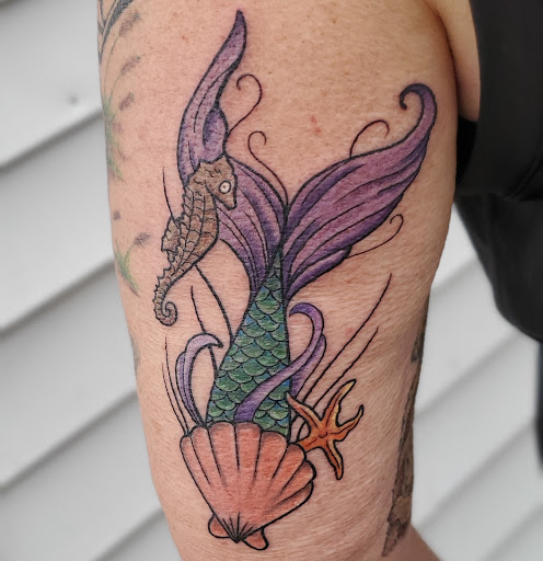 Explore trisomy 21 down syndrome tattoo ideas, creative tattoo ideas in Shelbyville, available at The Copper Phoenix