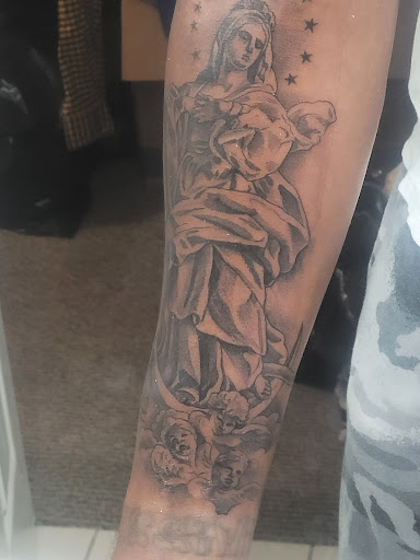 Explore tattoo ideas men arm, creative tattoo ideas in Riverside, available at The Madd Tatterz Tattoo Parlor