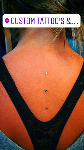 Explore chest piece tattoo ideas for women, creative tattoo ideas in Elko, available at Custom Tattoos and Body Piercing Studio