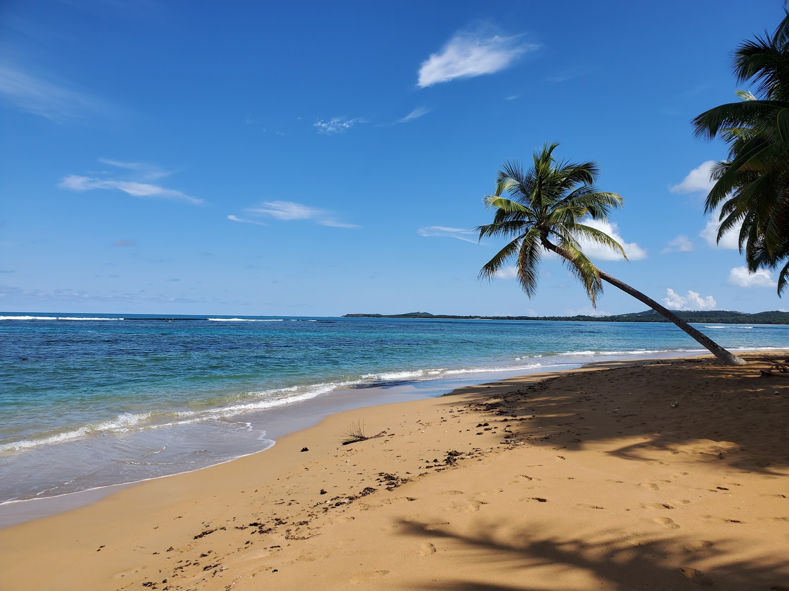 Foto von Playa Migel II mit feiner beiger sand Oberfläche