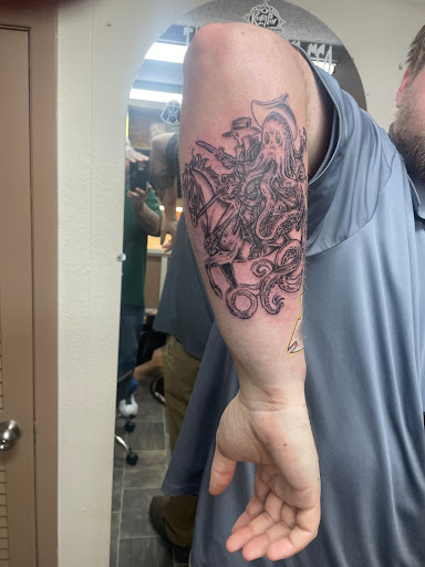 Find tattoo ideas under breast for your next unique tattoo in Sioux City at Asawolf Viking Tattoo