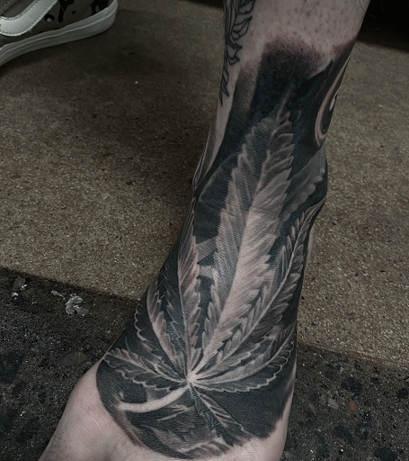 Explore ampersand tattoo ideas, creative tattoo ideas in Oklahoma City, available at Oklahoma Tattoo Collective