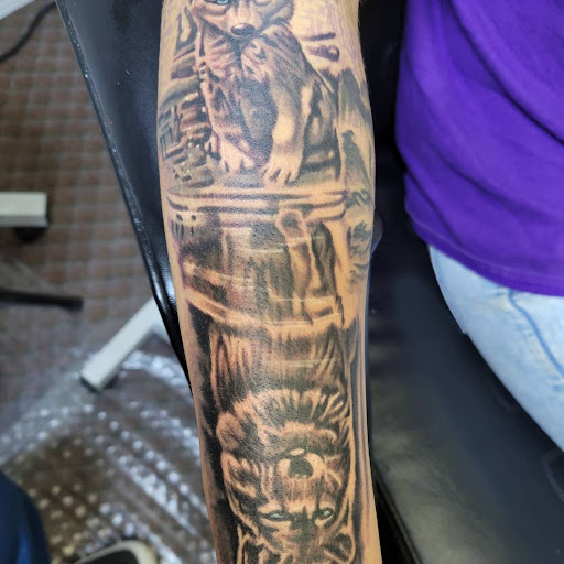 Explore zodiac tattoo ideas for men, creative tattoo ideas in Angola, available at Hoodlum Ink