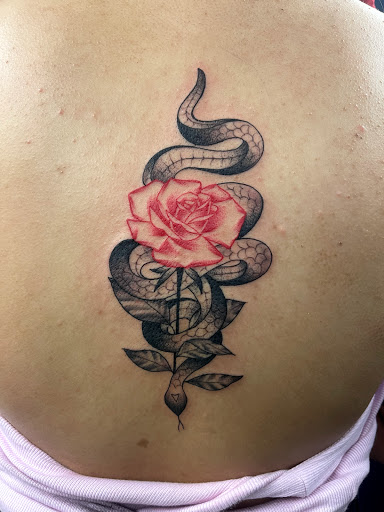 Explore tattoo ideas on ribs for guys, creative tattoo ideas in Sanford, available at Luv Ink