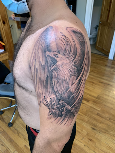 Explore genesis tattoo ideas, creative tattoo ideas in Baldwinsville, available at Tymeless Tattoo