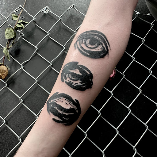 Explore sleeve tattoo fill in ideas, creative tattoo ideas in Buffalo, available at True Gloom Tattoo Studio